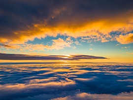 Köd feletti napnyugta