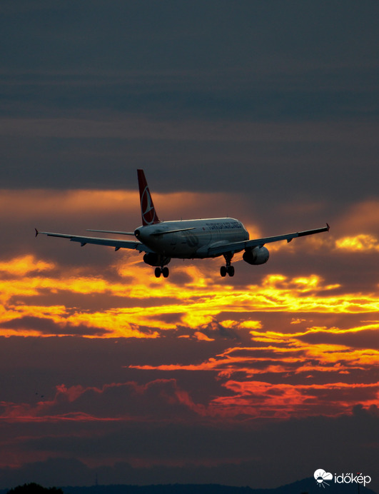 Turkish Airlines landing at sunset