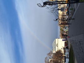 Zápor és szivárvány a Deák tér felett