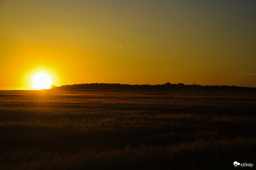 Aranyórás naplemente 