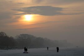 Párás naplemente a jégről fotózva